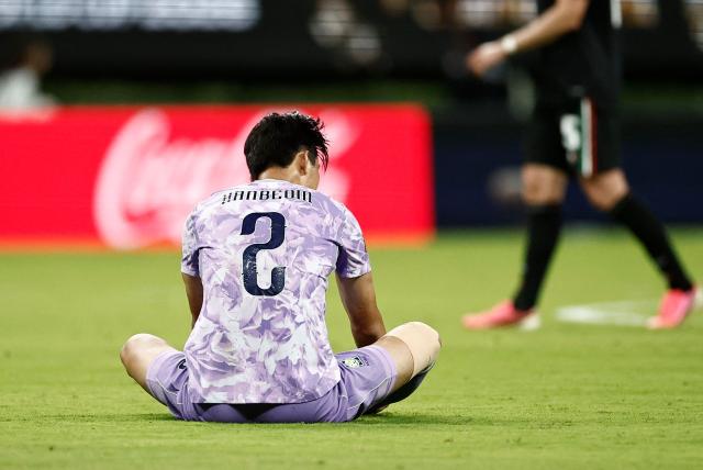 South Korea's defender #02 Lee Han-beom reacts after losing during the 2026 World Cup Group A football match between Mexico and South Korea at the Guadalajara Stadium in Zapopan on June 18, 2026.  (Photo by Ulises RUIZ / AFP)