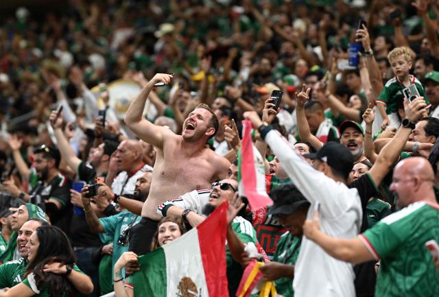 Mexican fans celebrate after the 2026 World Cup Group A football match between Mexico and South Korea at the Guadalajara Stadium in Zapopan on June 18, 2026.  (Photo by CARL DE SOUZA / AFP)