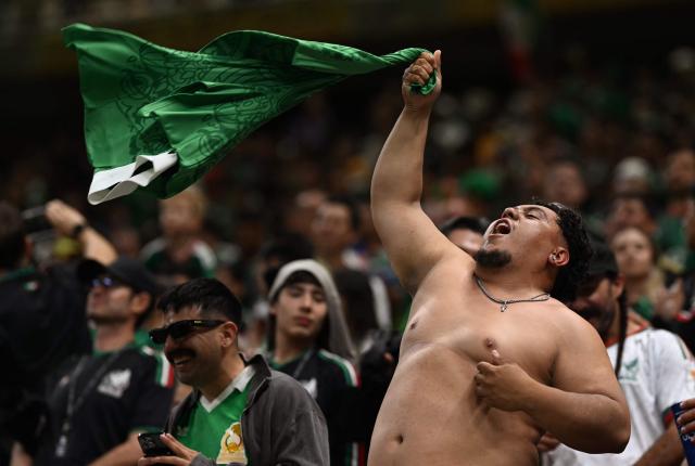 A Mexican fan celebrates after the 2026 World Cup Group A football match between Mexico and South Korea at the Guadalajara Stadium in Zapopan on June 18, 2026.  (Photo by CARL DE SOUZA / AFP)