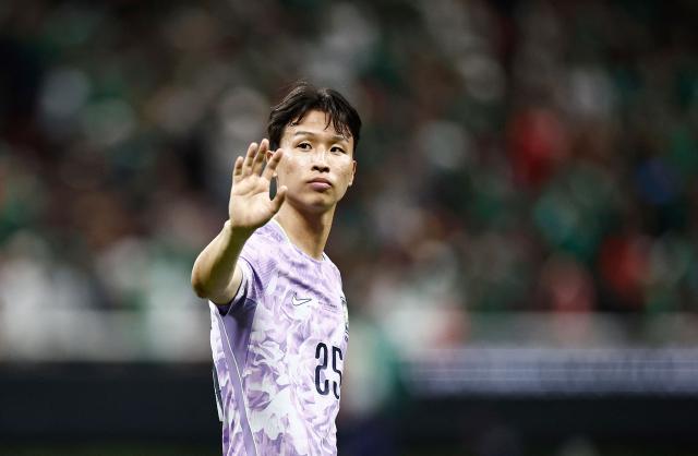 South Korea's midfielder #25 Eom Ji-sung reacts after losing the 2026 World Cup Group A football match between Mexico and South Korea at the Guadalajara Stadium in Zapopan on June 18, 2026.  (Photo by Ulises RUIZ / AFP)