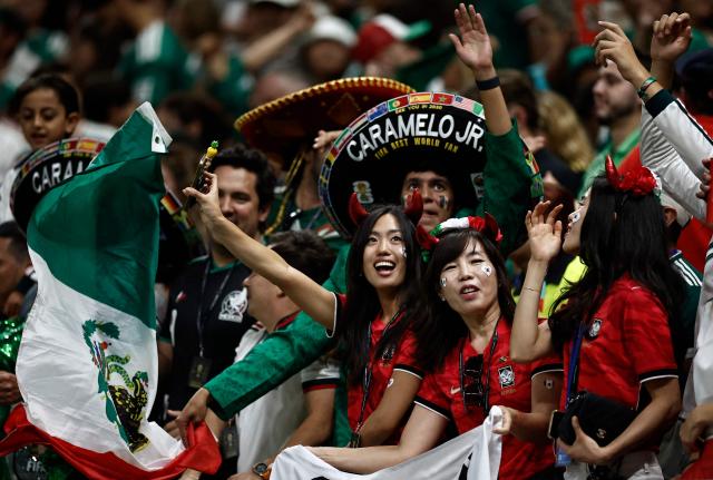Mexican fans celebrate after the 2026 World Cup Group A football match between Mexico and South Korea at the Guadalajara Stadium in Zapopan on June 18, 2026.  (Photo by Ulises RUIZ / AFP)