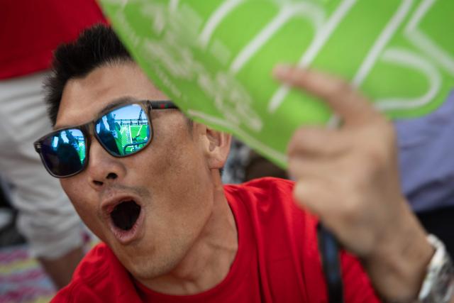 South Korea fans react during the 2026 World Cup match between South Korea and Mexico at Seoul International Park in the Koreatown neighborhood of Los Angeles on June 18, 2026. (Photo by ETIENNE LAURENT / AFP)