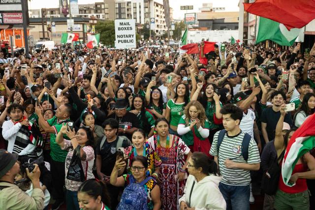 Mexico fans cheer after their team won the 2026 World Cup match between South Korea and Mexico at Seoul International Park in the Koreatown neighborhood of Los Angeles on June 18, 2026. (Photo by ETIENNE LAURENT / AFP)