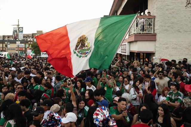 Mexico fans cheer after their team won the 2026 World Cup match between South Korea and Mexico at Seoul International Park in the Koreatown neighborhood of Los Angeles on June 18, 2026. (Photo by ETIENNE LAURENT / AFP)