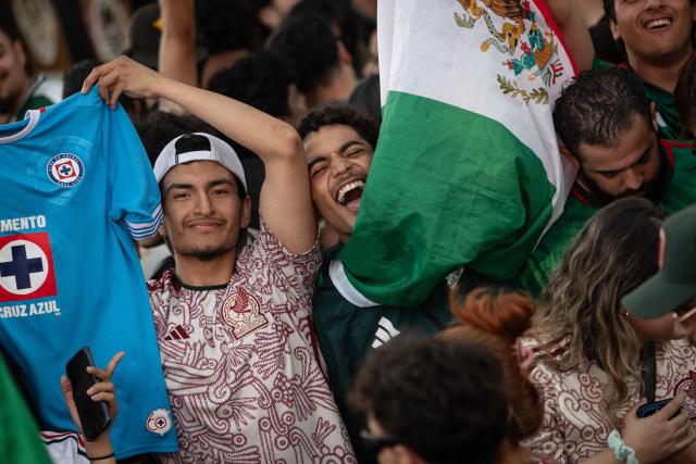Mexico fans cheer after their team won the 2026 World Cup match between South Korea and Mexico at Seoul International Park in the Koreatown neighborhood of Los Angeles on June 18, 2026. (Photo by ETIENNE LAURENT / AFP)