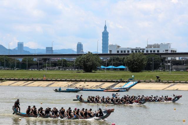 Rowers participate in a dragon boat race to celebrate the Dragon Boat Festival in Taipei on June 19, 2026 (Photo by I-Hwa Cheng / AFP)