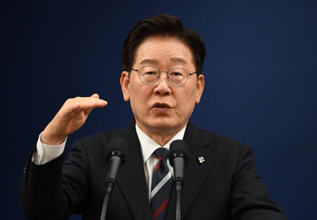 South Korean President Lee Jae Myung speaks during a press conference on his G7 trip at the presidential Blue House in Seoul on June 19, 2026. Donald Trump wants to turn his attention to North Korea now that he has an accord with Iran, South Korea's president said June 19, after meeting his US counterpart in France. (Photo by Jung Yeon-je / AFP)