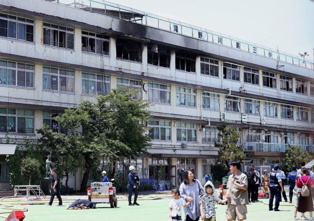 This photo shows Takinogawa Dai-san Elementary School, where a fire broke out on the fourth floor of the school building in Tokyo on June 19, 2026. A fire broke out at an elementary school in Tokyo on June 19, injuring at least one person, but all children and staff were evacuated safely, Japanese media reports said. (Photo by JIJI PRESS / AFP) / Japan OUT