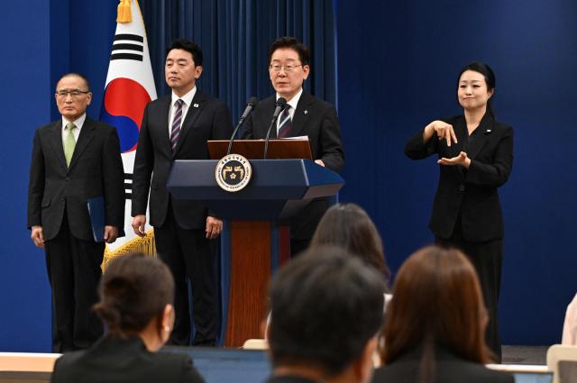 South Korean President Lee Jae Myung (C) speaks during a press conference on his G7 trip at the presidential Blue House in Seoul on June 19, 2026. Donald Trump wants to turn his attention to North Korea now that he has an accord with Iran, South Korea's president said June 19, after meeting his US counterpart in France. (Photo by Jung Yeon-je / AFP)