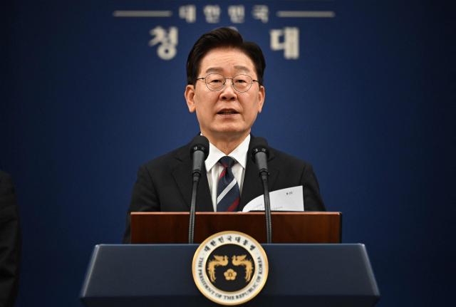 South Korean President Lee Jae Myung speaks during a press conference on his G7 trip at the presidential Blue House in Seoul on June 19, 2026. Donald Trump wants to turn his attention to North Korea now that he has an accord with Iran, South Korea's president said June 19, after meeting his US counterpart in France. (Photo by Jung Yeon-je / AFP)