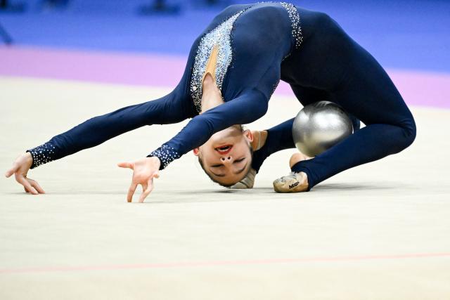 Azerbaijan's Fidan Gurbanli competes in the individual ball of the 2026 Rhythmic Gymnastics World Challenge Cup in Beijing on June 19, 2026. (Photo by WANG Zhao / AFP)