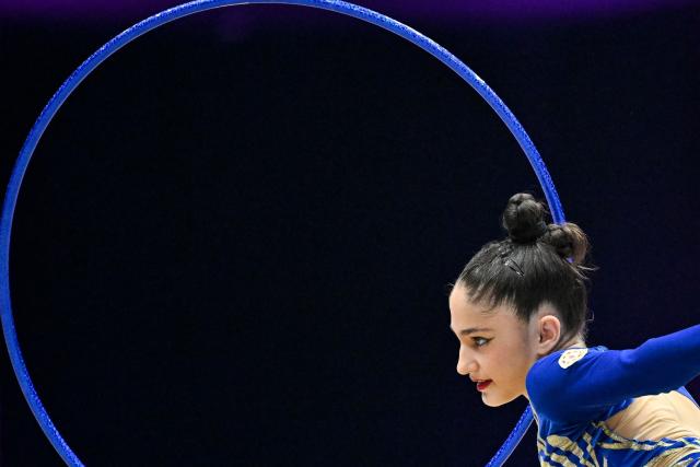 Azerbaijan's Fidan Gurbanli competes in the individual hoop of the 2026 Rhythmic Gymnastics World Challenge Cup in Beijing on June 19, 2026. (Photo by WANG Zhao / AFP)