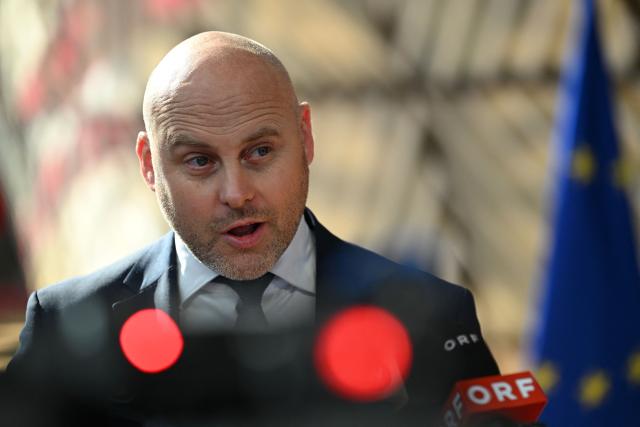 Latvia's Prime Minister Andris Kulbergs gives a statement upon arriving to attend the EU Summit at the EU headquarters in Brussels, on June 19, 2026. (Photo by Nicolas TUCAT / AFP)