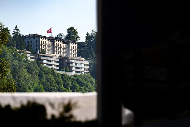 This photograph shows a part of the Burgenstock luxury hotel complex above Lake Lucerne, where talks following up on a deal to end the Middle East conflict were scheduled to begin, on June 19, 2026. Switzerland announced on June 19, 2026 that planned talks following up on the deal to end the Middle East war had been postponed, hours after US Vice President JD Vance's departure for the Alpine country was cancelled. (Photo by Fabrice COFFRINI / AFP)