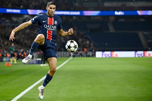 (FILES) Paris Saint-Germain's Moroccan midfielder #02 Achraf Hakimi controls the ball during the UEFA Champions League 1st round day 1 football match between Paris Saint-Germain (PSG) and Girona FC at the Parc des Princes Stadium, in Paris, on September 18, 2024. A French appeals court on June 19, 2026 confirmed Moroccan football star Achraf Hakimi will stand trial charged with raping a young woman. In February 2023, a woman then aged 24 told police in the Val-De-Marne region southeast of Paris that Hakimi had raped her. The Paris Saint-Germain player and captain of the Moroccan national team, whose side are playing their second World Cup match on June 19 against Scotland, has consistently denied the allegations. (Photo by JULIEN DE ROSA / AFP)