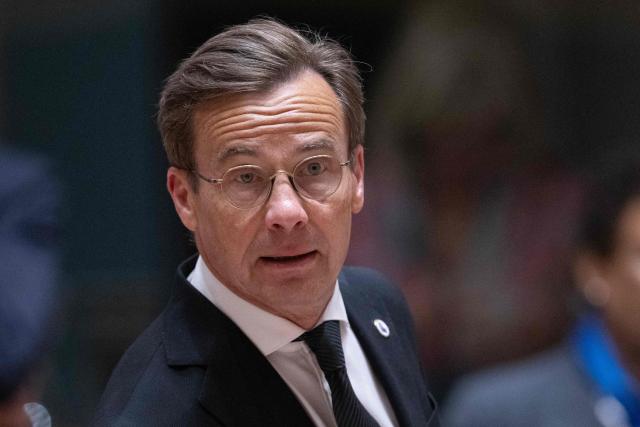 Sweden's Prime Minister Ulf Kristersson arrives to attend a round table meeting during the EU Summit at the EU headquarters in Brussels, on June 19, 2026. (Photo by JOHN THYS / AFP)
