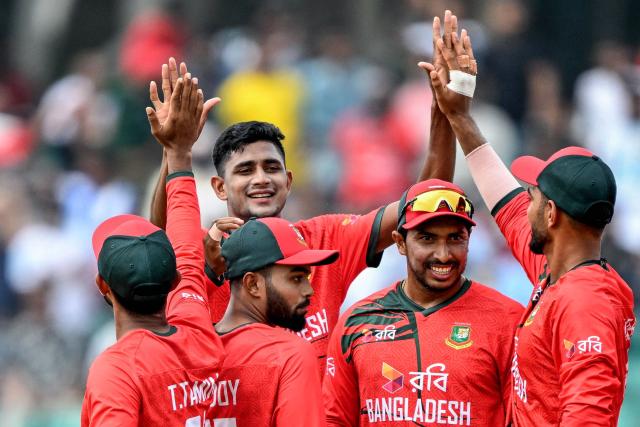 Bangladesh's Nahid Rana (2L, back) celebrates with teammates after taking the wicket of Australia's Cooper Connolly during the second Twenty20 (T20) international cricket match between Bangladesh and Australia at the Bir Sreshtho Flight Lieutenant Matiur Rahman Stadium in Chattogram on June 19, 2026. (Photo by AFP)