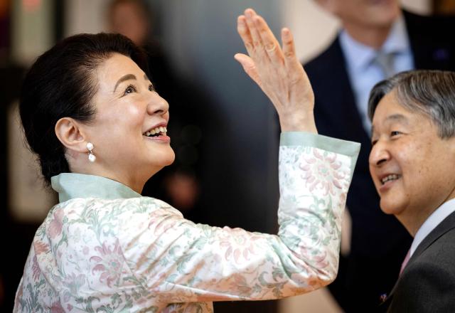 Empress Masako of Japan (L) waves during a visit at the Princess Máxima Centre for Pediatric Oncology in Utrecht on June 19, 2026, as part of Japan's imperial couple three-day visit to The Netherlands. (Photo by Remko de Waal / ANP / AFP) / Netherlands OUT