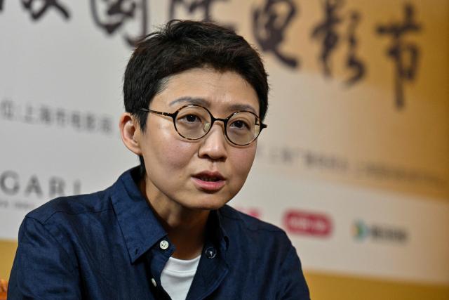 Chinese director and jury member Liu Jiayin speaks during an interview with AFP at the 28th Shanghai International Film Festival in Shanghai on June 19, 2026. (Photo by Hector RETAMAL / AFP)