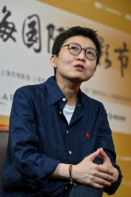 Chinese director and jury member Liu Jiayin speaks during an interview with AFP at the 28th Shanghai International Film Festival in Shanghai on June 19, 2026. (Photo by Hector RETAMAL / AFP)