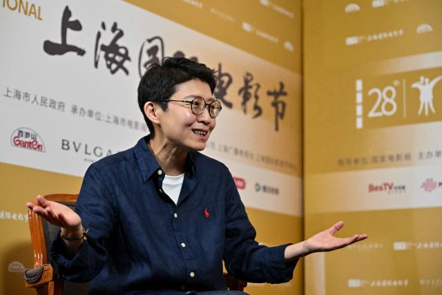 Chinese director and jury member Liu Jiayin speaks during an interview with AFP at the 28th Shanghai International Film Festival in Shanghai on June 19, 2026. (Photo by Hector RETAMAL / AFP)