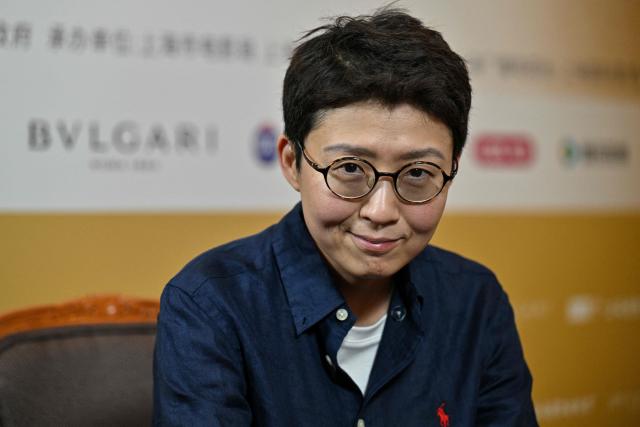 Chinese director and jury member Liu Jiayin speaks during an interview with AFP at the 28th Shanghai International Film Festival in Shanghai on June 19, 2026. (Photo by Hector RETAMAL / AFP)