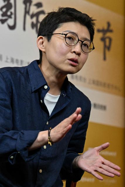 Chinese director and jury member Liu Jiayin speaks during an interview with AFP at the 28th Shanghai International Film Festival in Shanghai on June 19, 2026. (Photo by Hector RETAMAL / AFP)