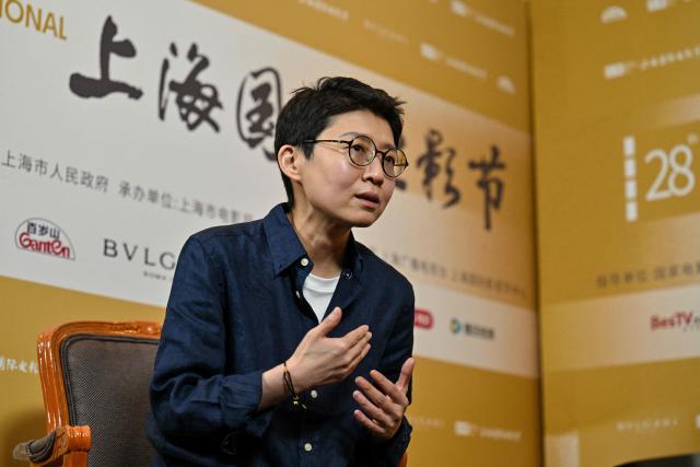Chinese director and jury member Liu Jiayin speaks during an interview with AFP at the 28th Shanghai International Film Festival in Shanghai on June 19, 2026. (Photo by Hector RETAMAL / AFP)