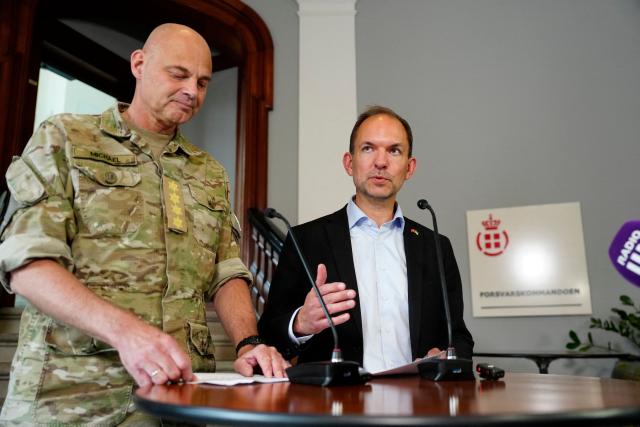 Danish Defence Minister Jeppe Bruus (R) and Denmark's Chief of Defence Michael Hyldgaard comment on a report on alleged drone incursions in Denmark in the fall of 2025, at the Ministry of Defense in Copenhagen, Denmark, on June 19, 2026. (Photo by Sebastian Elias Uth / Ritzau Scanpix / AFP) / Denmark OUT