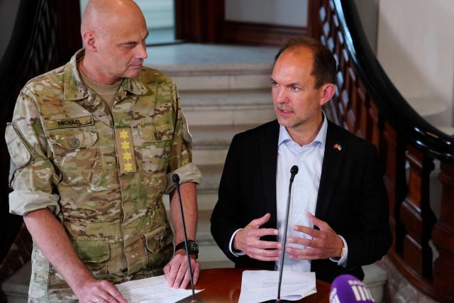 Danish Defence Minister Jeppe Bruus (R) and Denmark's Chief of Defence Michael Hyldgaard comment on a report on alleged drone incursions in Denmark in the fall of 2025, at the Ministry of Defense in Copenhagen, Denmark, on June 19, 2026. (Photo by Sebastian Elias Uth / Ritzau Scanpix / AFP) / Denmark OUT