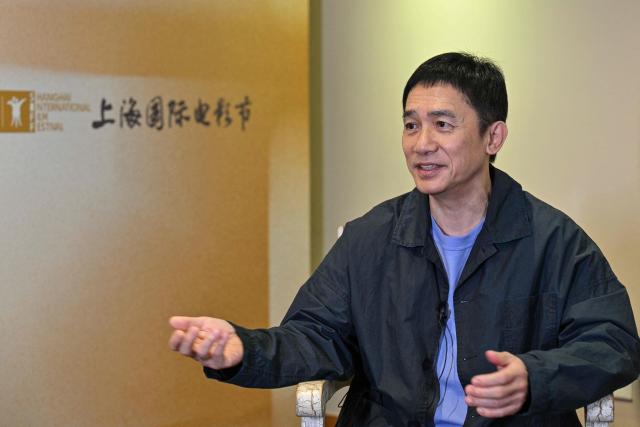 Hong Kong actor Tony Leung Chiu-wai speaks during an interview with AFP at the 28th Shanghai International Film Festival in Shanghai on June 19, 2026. (Photo by Hector RETAMAL / AFP)