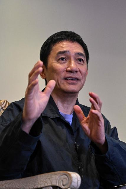 Hong Kong actor Tony Leung Chiu-wai speaks during an interview with AFP at the 28th Shanghai International Film Festival in Shanghai on June 19, 2026. (Photo by Hector RETAMAL / AFP)