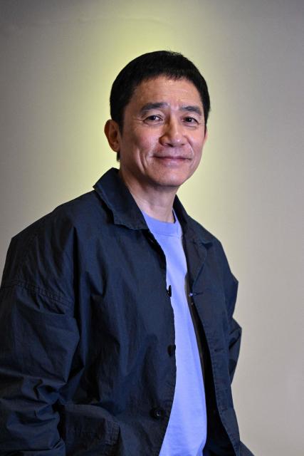 Hong Kong actor Tony Leung Chiu-wai poses for a picture during an interview with AFP at the 28th Shanghai International Film Festival in Shanghai on June 19, 2026. (Photo by Hector RETAMAL / AFP)