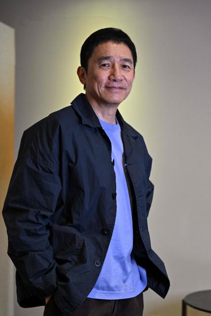 Hong Kong actor Tony Leung Chiu-wai poses for a picture during an interview with AFP at the 28th Shanghai International Film Festival in Shanghai on June 19, 2026. (Photo by Hector RETAMAL / AFP)