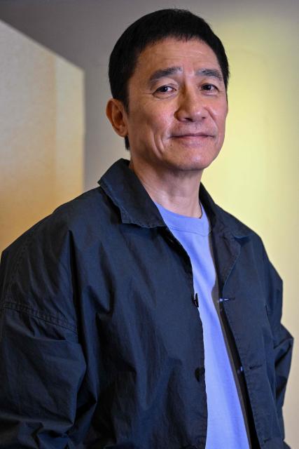 Hong Kong actor Tony Leung Chiu-wai poses for a picture during an interview with AFP at the 28th Shanghai International Film Festival in Shanghai on June 19, 2026. (Photo by Hector RETAMAL / AFP)