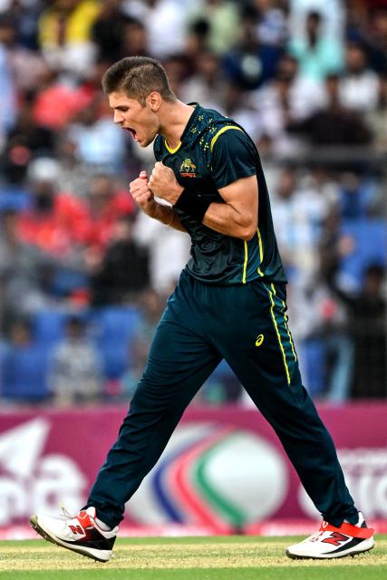 Australia's Aaron Hardie celebrates after taking the wicket of Bangladesh's Parvez Hossain Emon during the second Twenty20 (T20) international cricket match between Bangladesh and Australia at the Bir Sreshtho Flight Lieutenant Matiur Rahman Stadium in Chattogram on June 19, 2026. (Photo by AFP)