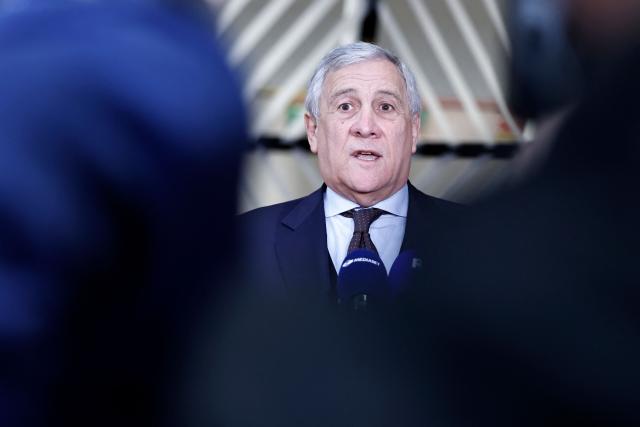 (FILES) Italy's Foreign Minister Antonio Tajani talks to journalists upon arrival ahead of a EU Foreign Affairs Council meeting at the EU headquarters in Brussels on January 29, 2026. Italy's foreign minister on June 19, 2026 said he was cancelling a visit to the United States over reported comments by US President Donald Trump that appeared to mock Prime Minister Giorgia Meloni. "The grave and offensive words of President Trump... offend the whole of Italy," Foreign Minister Antonio Tajani, who had been due to visit the US on June 21 and 22, said on X. (Photo by SIMON WOHLFAHRT / AFP)