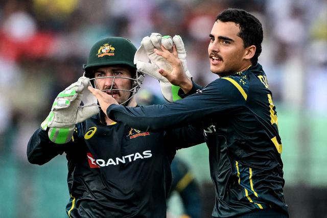 Australia's Joel Davies (R) celebrates with wicketkeeper Josh Inglis after taking the wicket of Bangladesh's Saif Hassan during the second Twenty20 (T20) international cricket match between Bangladesh and Australia at the Bir Sreshtho Flight Lieutenant Matiur Rahman Stadium in Chattogram on June 19, 2026. (Photo by AFP)