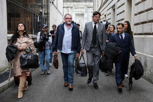 (FILES) French former anaesthetist Frederic Pechier (2nd L) arrives with his lawyers Ornella Spatafora (L),  Randall Schwerdorffer (2nd R) and Lee Takhedmit on the opening day of his trial, at Besancon's courthouse, in Besancon, north eastern France, on September 8, 2025. The civil hearing in the case of Frederic Pechier, the anaesthetist from Besancon who was sentenced to life imprisonment on december 18, 2025 is set to open on June 22, 2026. (Photo by Romeo BOETZLE / AFP)