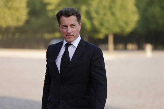 (FILES) Then French producer and director of the CNC Dominique Boutonnat arrives at a state dinner upon the visit of United Arab Emirates President at the Grand Trianon estate near the Palace of Versailles, south west of Paris, on July 18, 2022. The court in Versailles is set to deliberate, on June 22, 2026, in the appeal trial of Dominique Boutonnat, the former president of the CNC, who has been accused of sexual assault by his godson. (Photo by Ludovic MARIN / POOL / AFP)