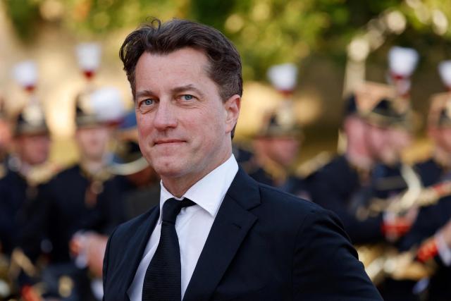 (FILES) Then French producer and director of the CNC Dominique Boutonnat arrives at a state dinner upon the visit of United Arab Emirates President at the Grand Trianon estate near the Palace of Versailles, south west of Paris, on July 18, 2022. The court in Versailles is set to deliberate, on June 22, 2026, in the appeal trial of Dominique Boutonnat, the former president of the CNC, who has been accused of sexual assault by his godson. (Photo by Ludovic MARIN / POOL / AFP)
