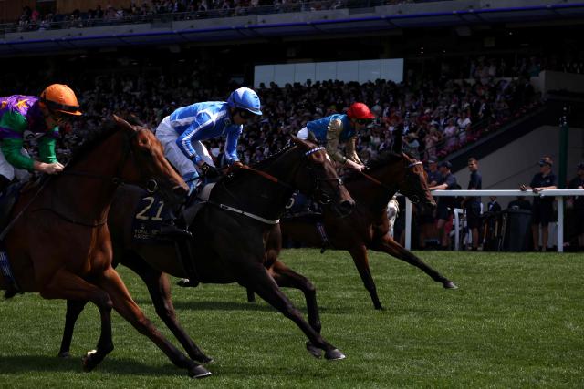 Jockey Clifford Lee on Venetian Sun (C) compete and win the Commonwealth cup on the fourth day of the Royal Ascot horse racing meeting in Ascot, west of London, on June 19, 2026. (Photo by Henry NICHOLLS / AFP)