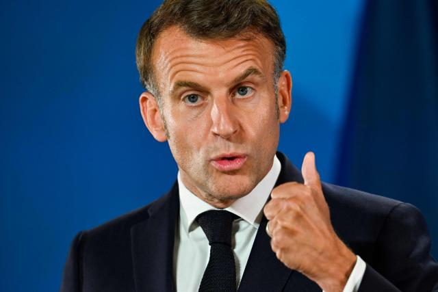 France's President Emmanuel Macron gestures as he speaks during the final press conference as part of the EU Summit at the EU headquarters in Brussels, on June 19, 2026. (Photo by JOHN THYS / AFP)