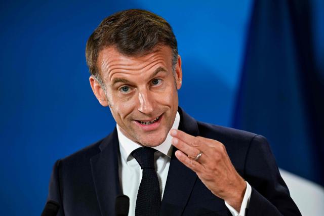 France's President Emmanuel Macron gestures as he speaks during the final press conference as part of the EU Summit at the EU headquarters in Brussels, on June 19, 2026. (Photo by JOHN THYS / AFP)