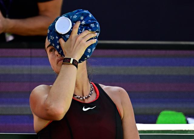Belarus' Aryna Sabalenka cools herself during her women's singles quarter-final match against Czech Republic's Nikola Bartunkova at the WTA500 Berlin Tennis Open tournament in Berlin on June 19, 2026. (Photo by Tobias SCHWARZ / AFP)