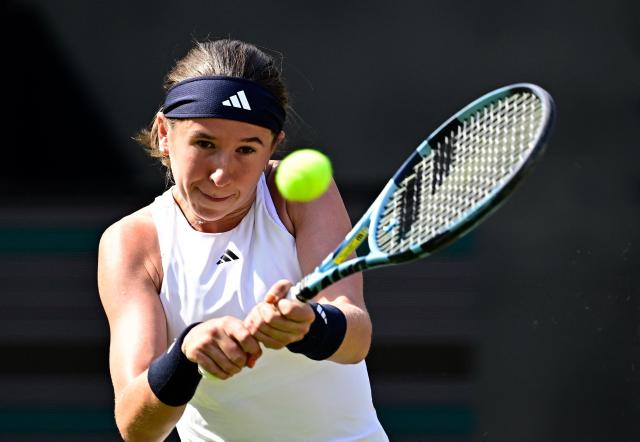 Czech Republic's Nikola Bartunkova returns a ball to Belarus' Aryna Sabalenka during their women's singles quarter-final match at the WTA500 Berlin Tennis Open tournament in Berlin on June 19, 2026. (Photo by Tobias SCHWARZ / AFP)