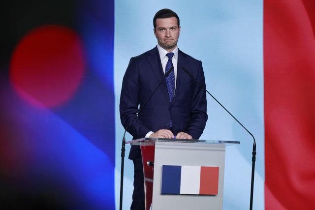 French far-right Rassemblement National (RN) party's President, member of the European Parliament and president of the Patriots for Europe (PfE) group Jordan Bardella attends a joint press conference with the leader of the main opposition right wing Law and Justice (PiS) party at the party's headquarters in Warsaw on June 19, 2026. Jordan Bardella is on a two day visit to poland meeting with leaders of Polands far right and touring the eastern border, marking the latest stop on his overseas tour aimed at strengthening his European alliances just a few months before the French presidential election. (Photo by Wojtek RADWANSKI / AFP)