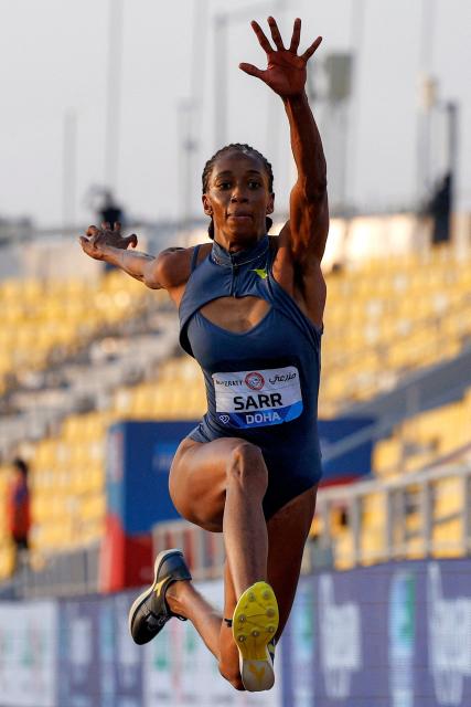 Senegal's Saly Sarr competes in the women's triple jump final during the IAAF Diamond League competition at Suheim Bin Hamad Stadium in Doha on June 19, 2026. (Photo by KARIM JAAFAR / AFP)