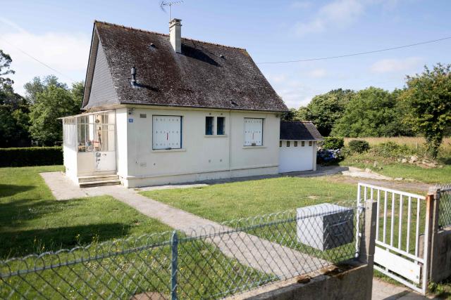 This photograph shows the house where human remains were found in the crawl space, in Bannalec on June 19, 2026. A man in his seventies has been charged with the murder of his partner after the remains of his former partner were discovered in the crawl space of a house in Bannalec on June 6, prompting an investigation by the gendarmerie, the Quimper prosecutor's office announced on June 19, 2026. (Photo by Fred TANNEAU / AFP)
