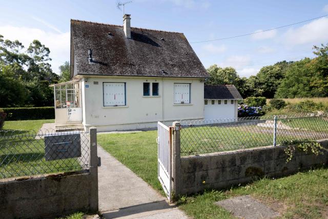 This photograph shows the house where human remains were found in the crawl space, in Bannalec on June 19, 2026. A man in his seventies has been charged with the murder of his partner after the remains of his former partner were discovered in the crawl space of a house in Bannalec on June 6, 2026, prompting an investigation by the gendarmerie, the Quimper prosecutor's office announced on June 19, 2026. (Photo by Fred TANNEAU / AFP)